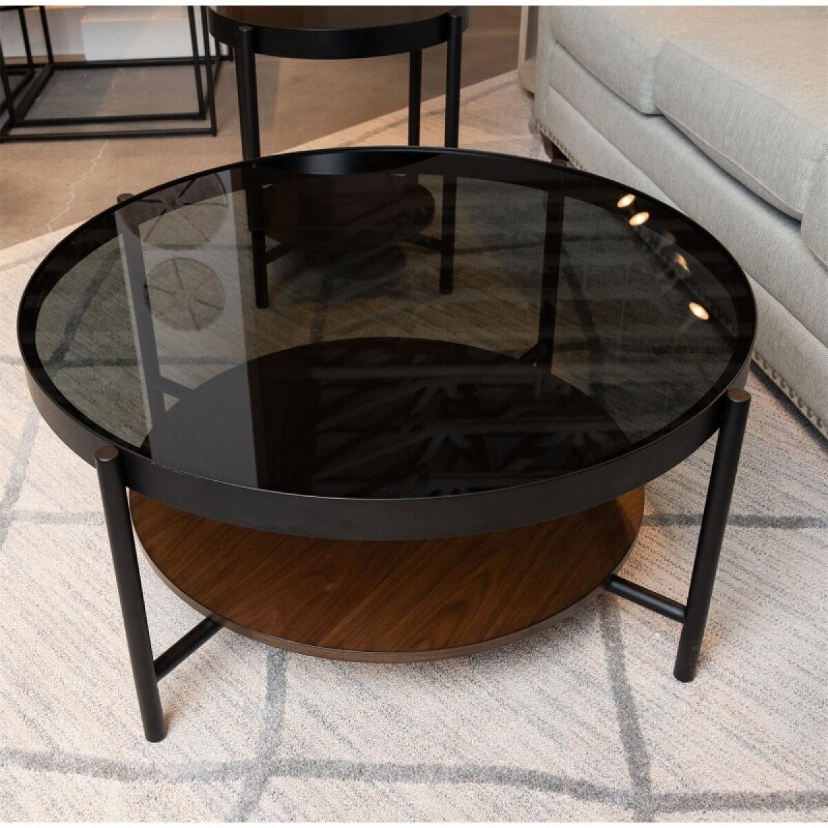 c4c5deba60b0eee7f2e4e5b0648a00c2 Round Cocktail Table - Image 1